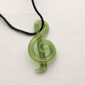Treble clef necklace